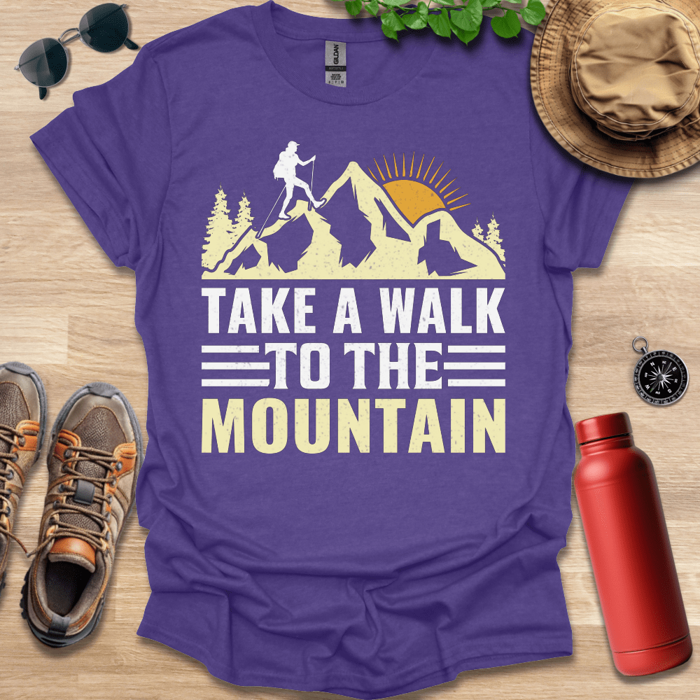 a purple shirt that says take a walk to the mountain