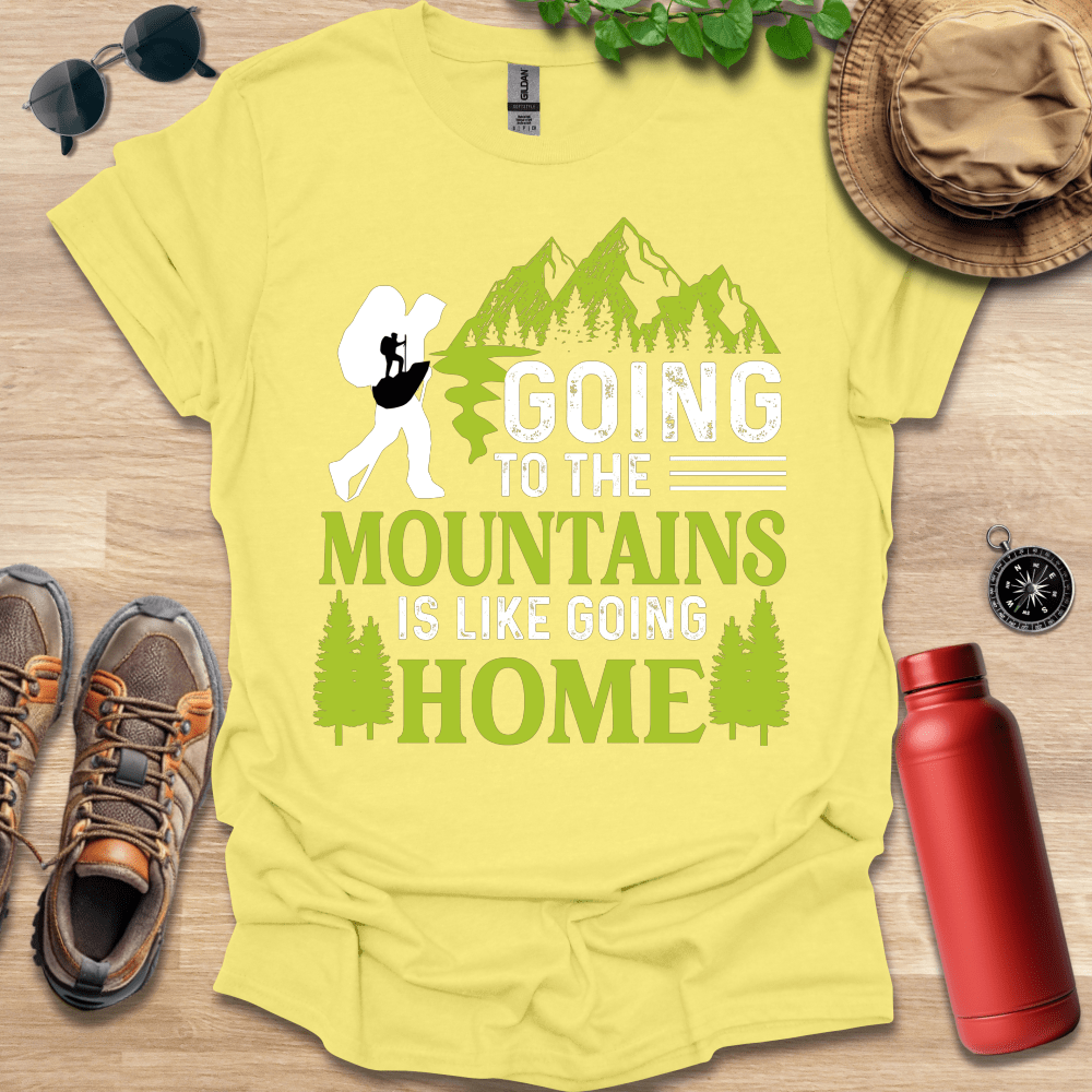 a t - shirt that says going to the mountains is like going home