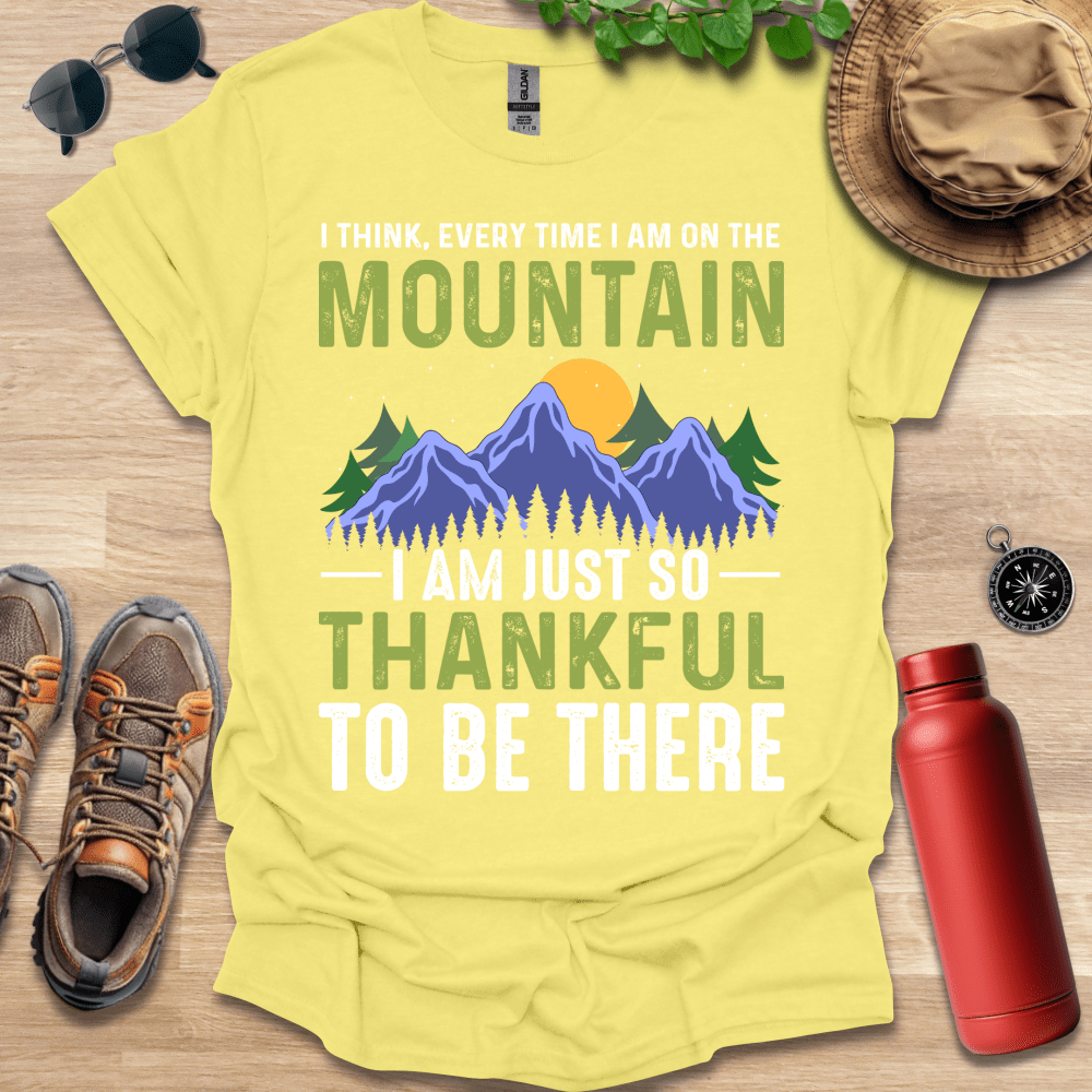 a t - shirt that says i think every time i am on the mountain i