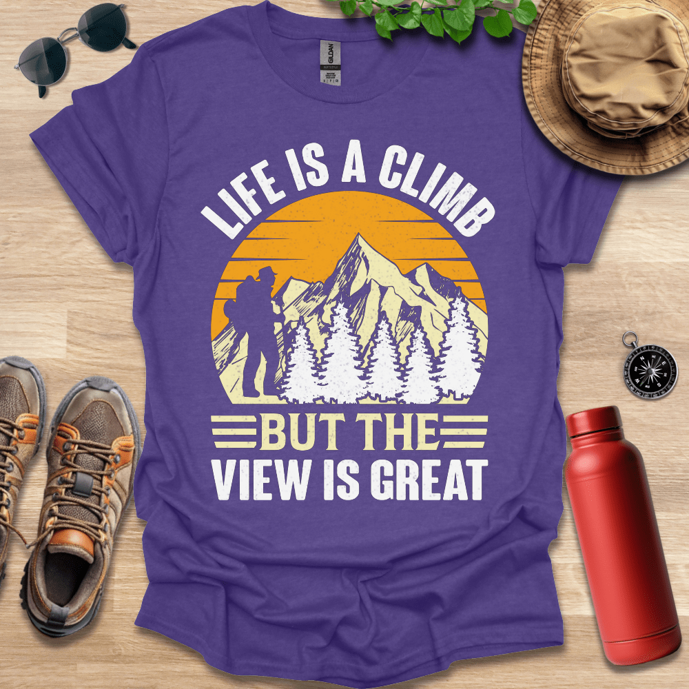 a purple t - shirt that says life is a climb but the view is great