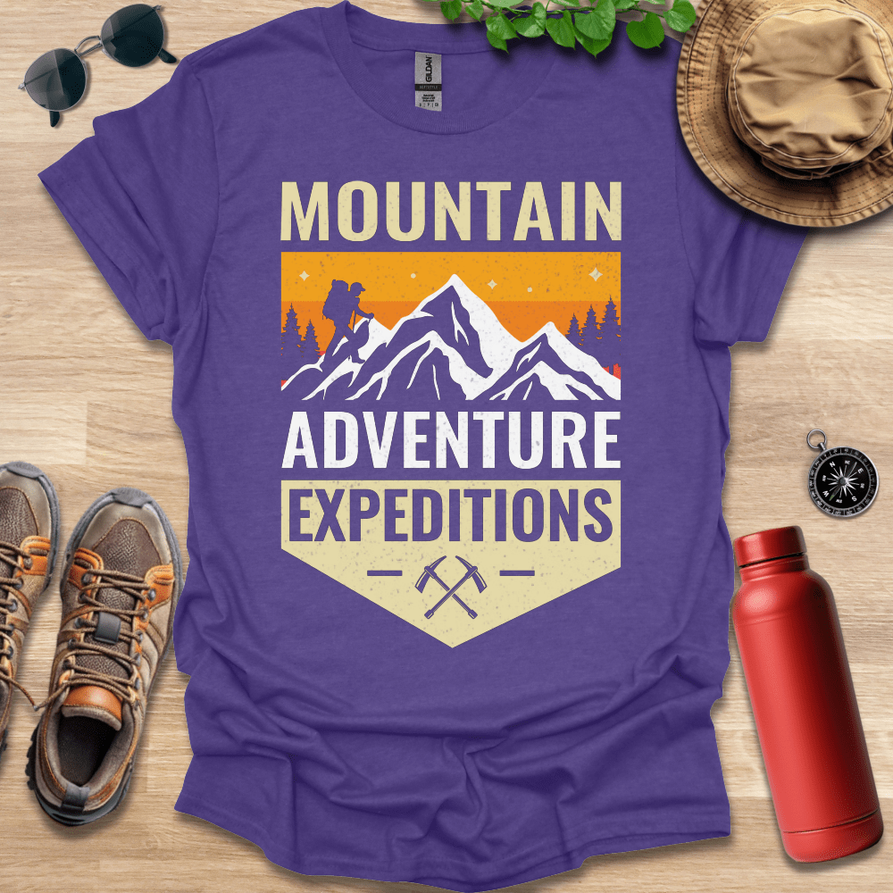 a purple shirt that says mountain adventure expedition