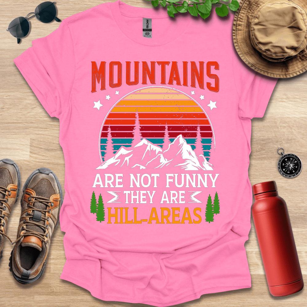 a pink shirt that says mountains are not funny they are hilarreas