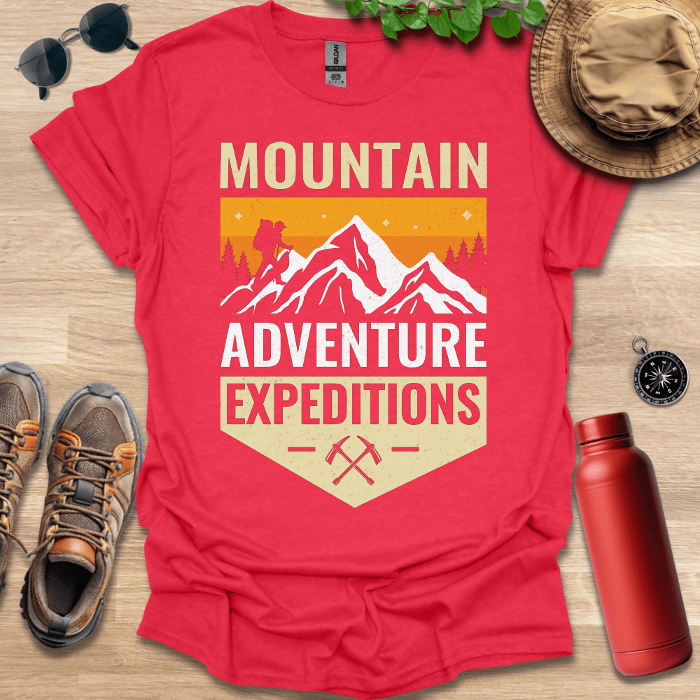 a red shirt with the words mountain adventure expedition on it