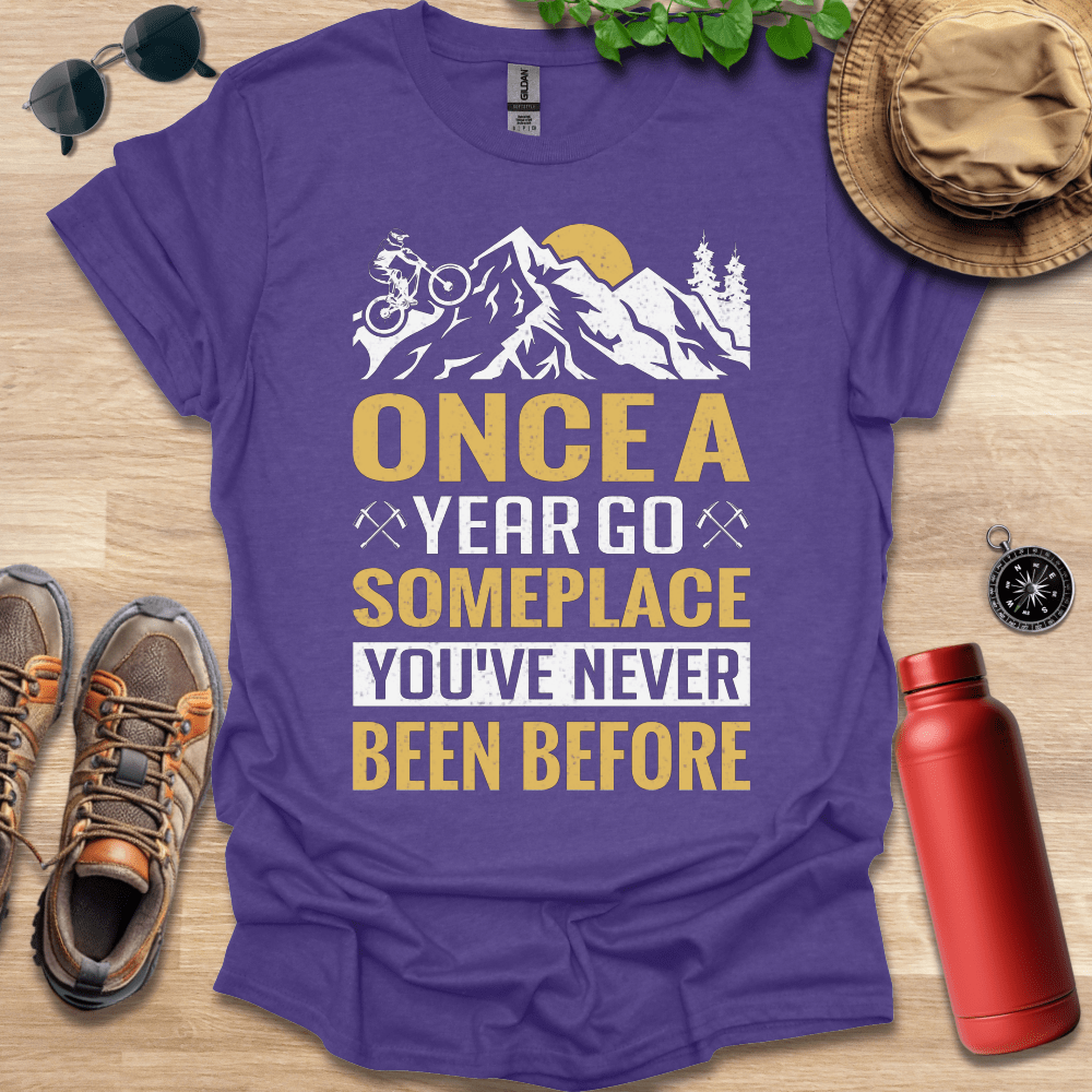 a t - shirt that says once a year go someplace you've never been