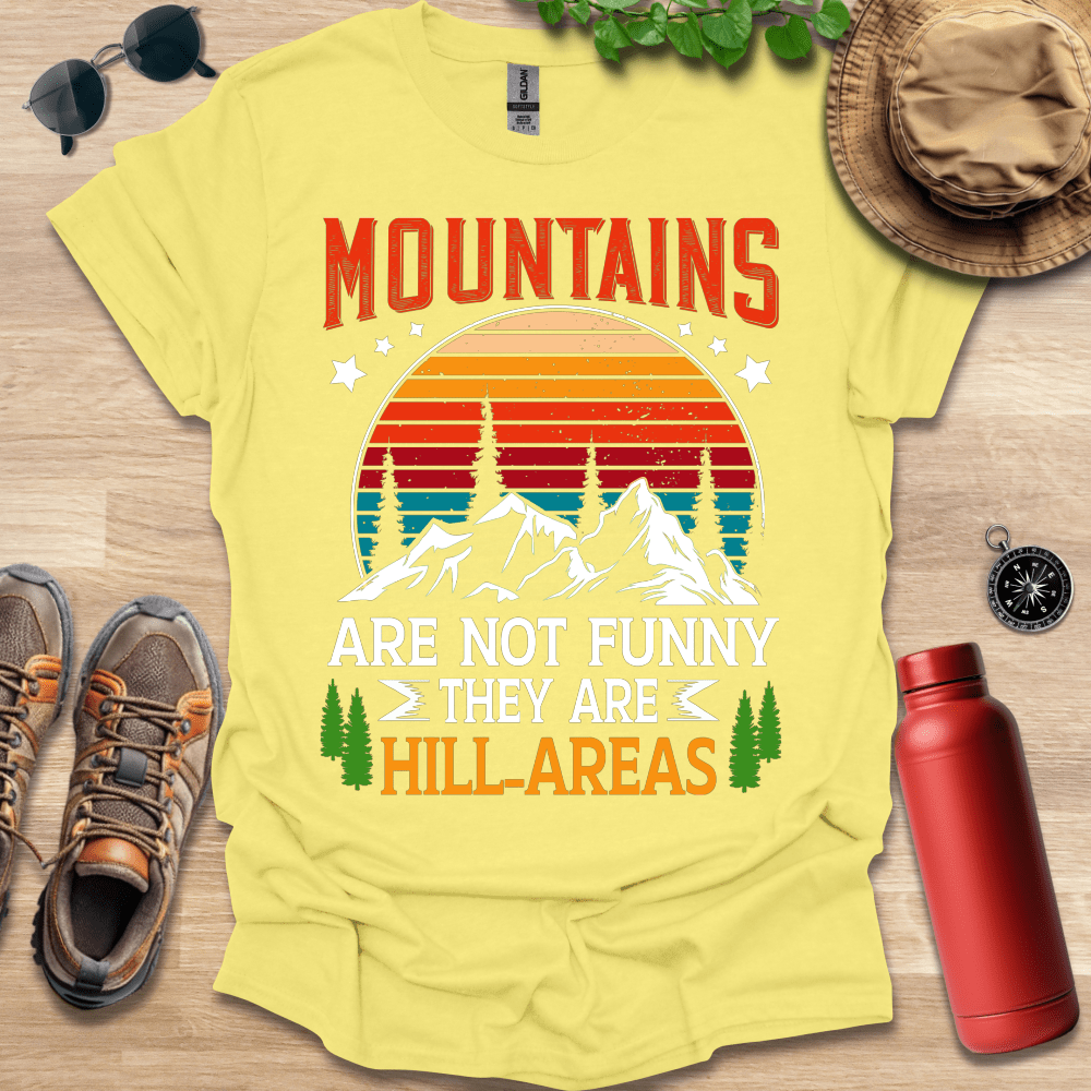 a yellow shirt that says mountains are not funny they are hilarreas