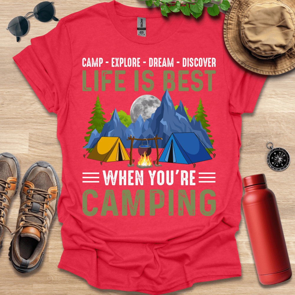 a red shirt that says camp explore dream discovery