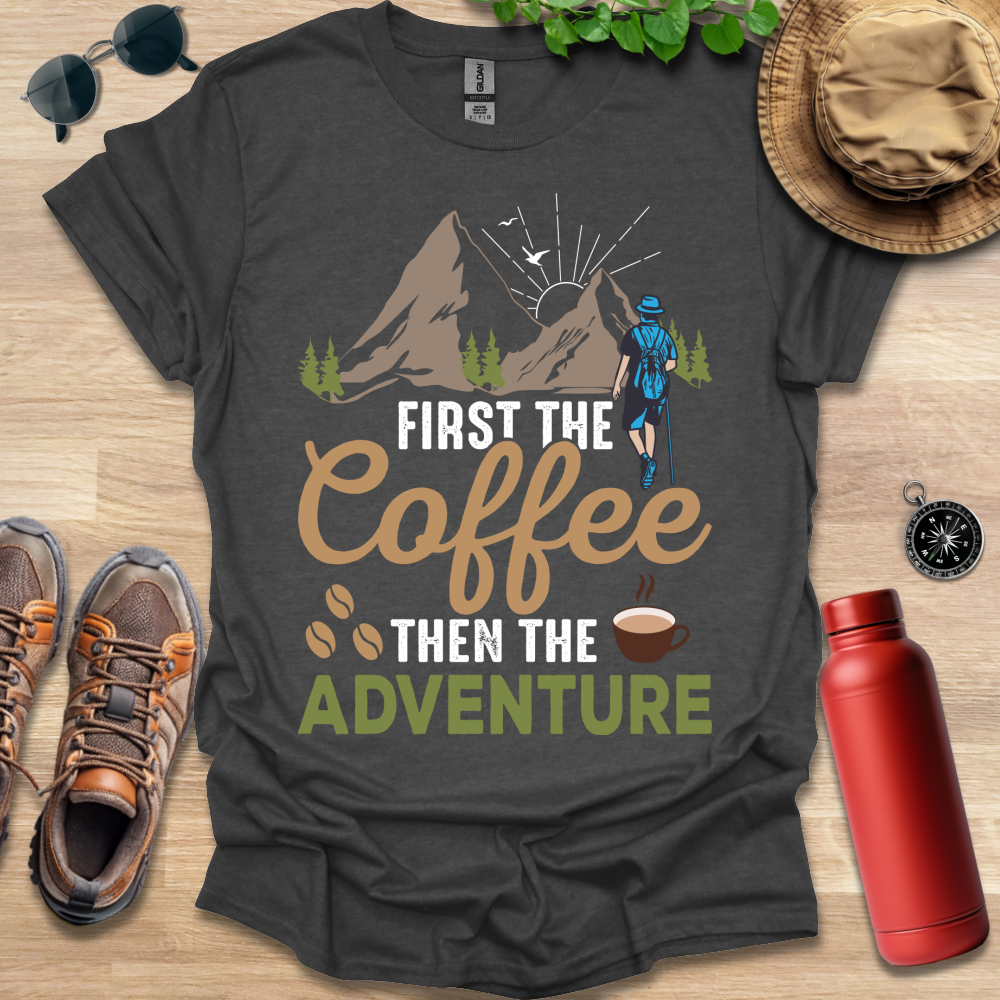 a t - shirt that says, first the coffee then the adventure