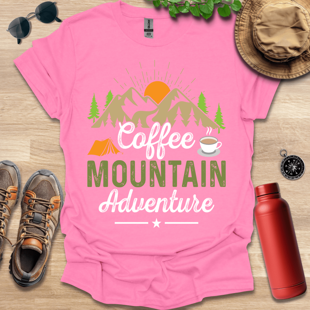 a pink shirt that says coffee mountain adventure