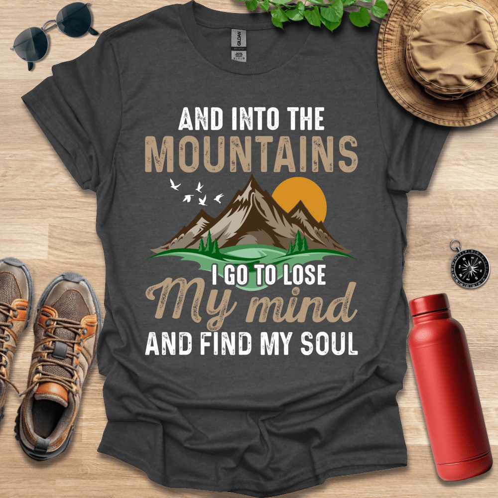 a shirt that says and into the mountains i go to lose my mind and find