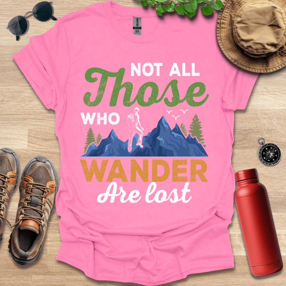 a pink t - shirt that says not all those who wander are lost