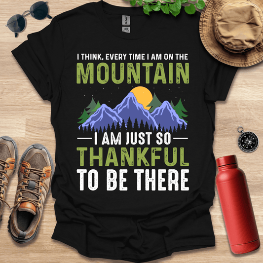 a t - shirt that says i think every time i am on the mountain i