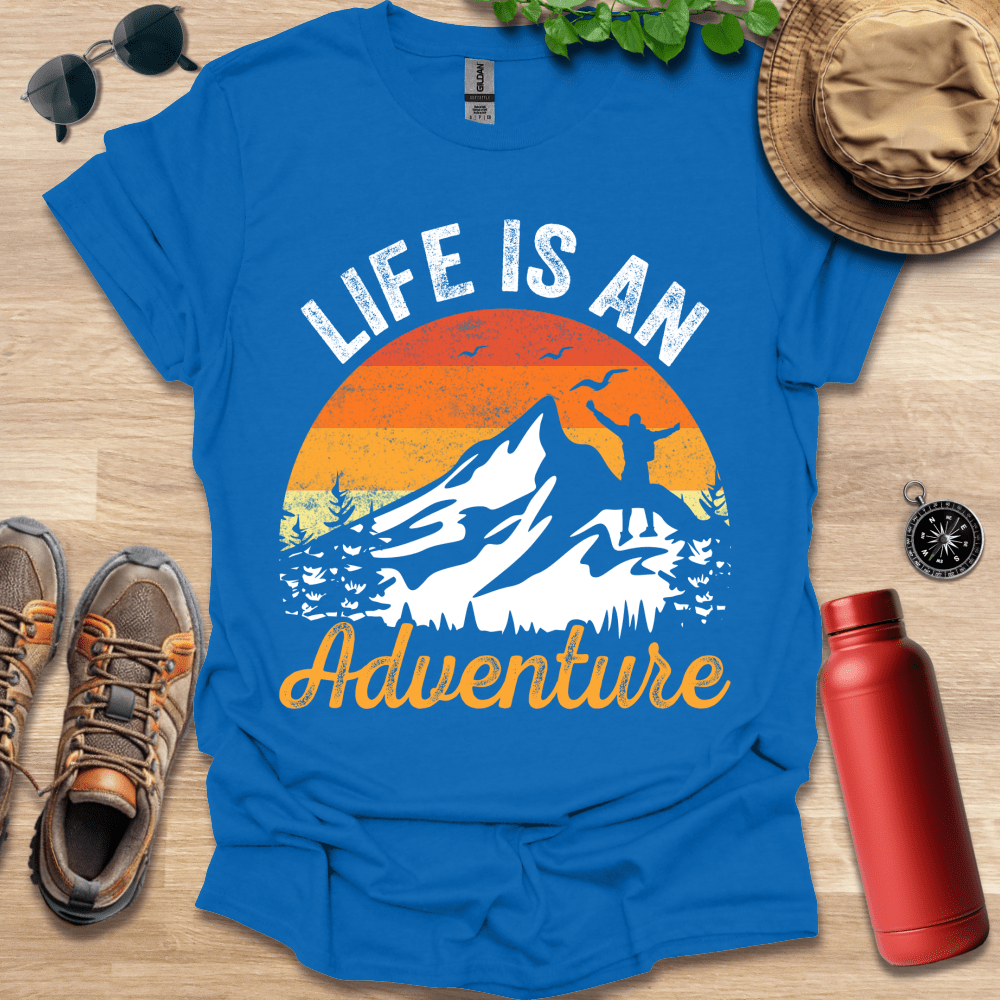 a blue t - shirt that says life is an adventure