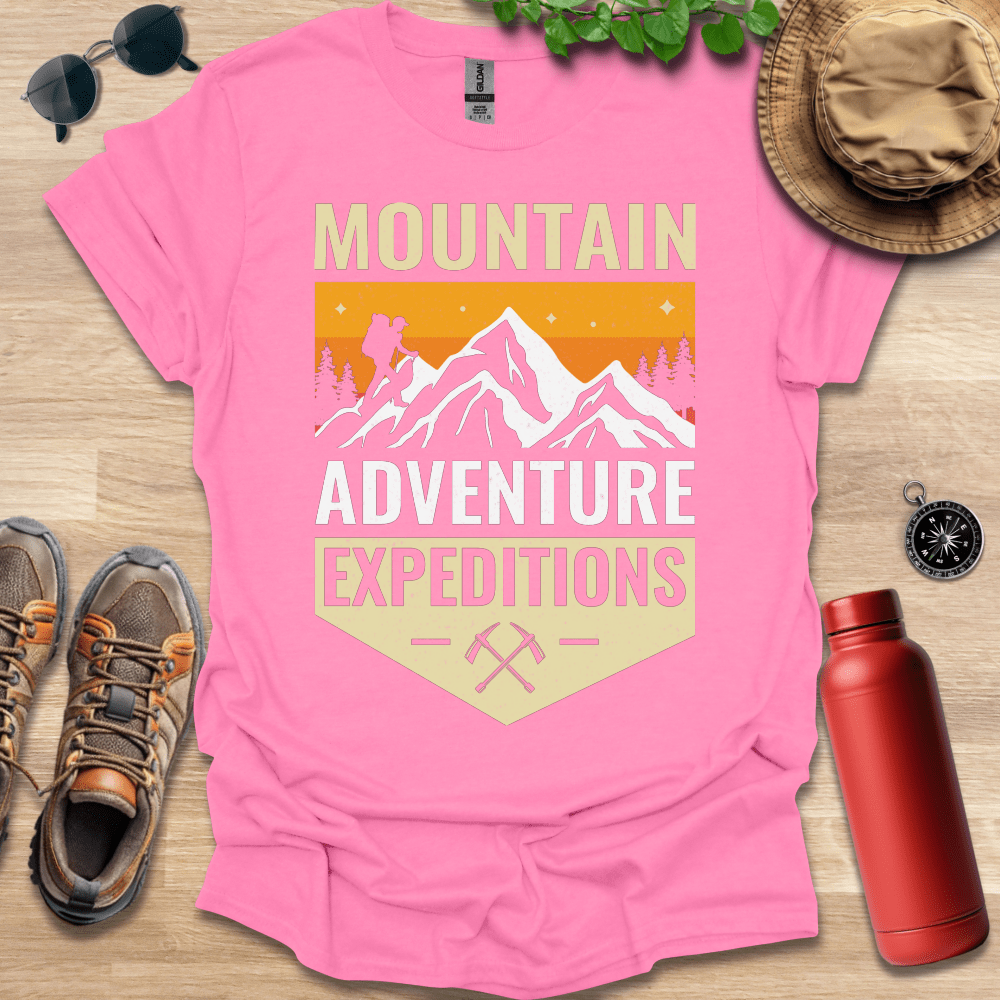 a pink shirt with the words mountain adventure on it