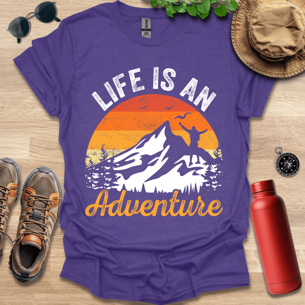 a purple shirt that says life is an adventure