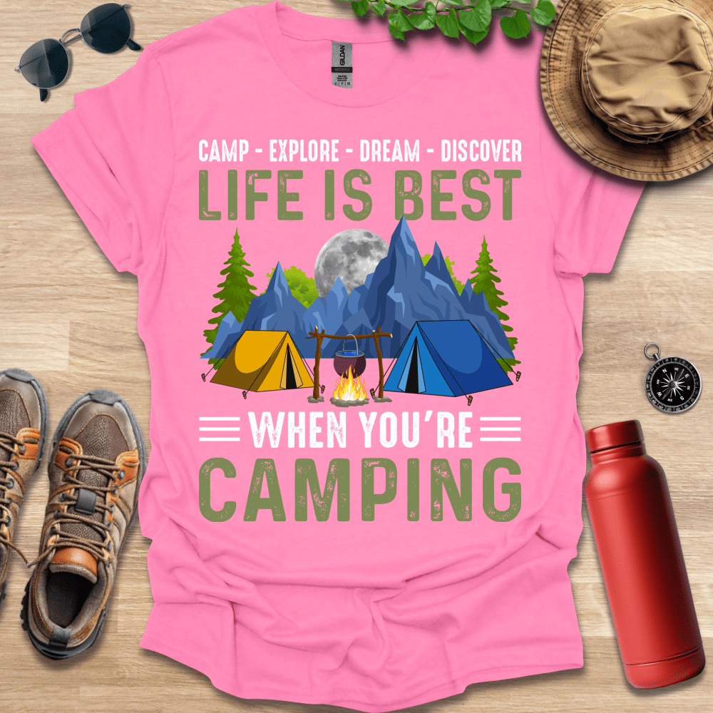 a pink shirt that says camp explore dream discovery life is best when you're