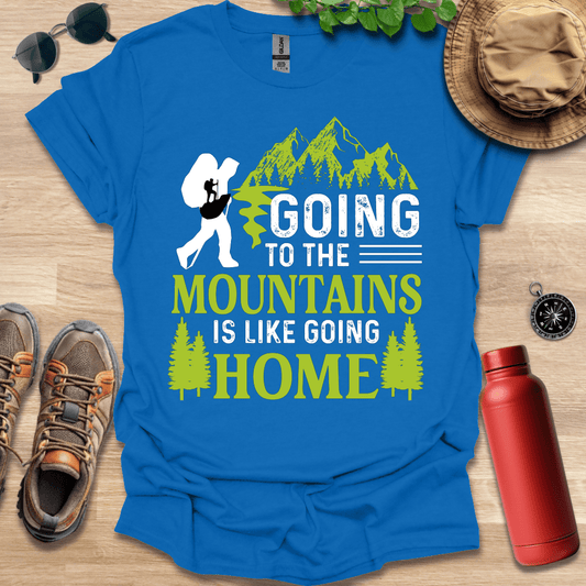 a blue shirt that says going to the mountains is like going home