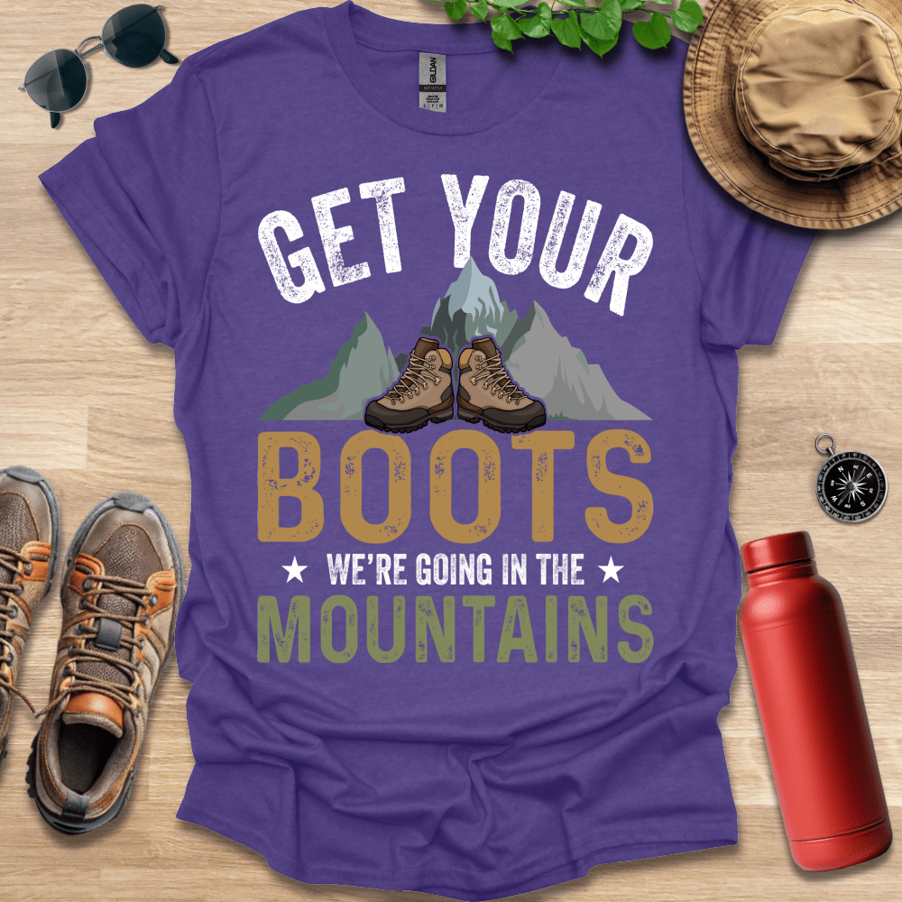 a purple shirt that says get your boots we're going in the mountains