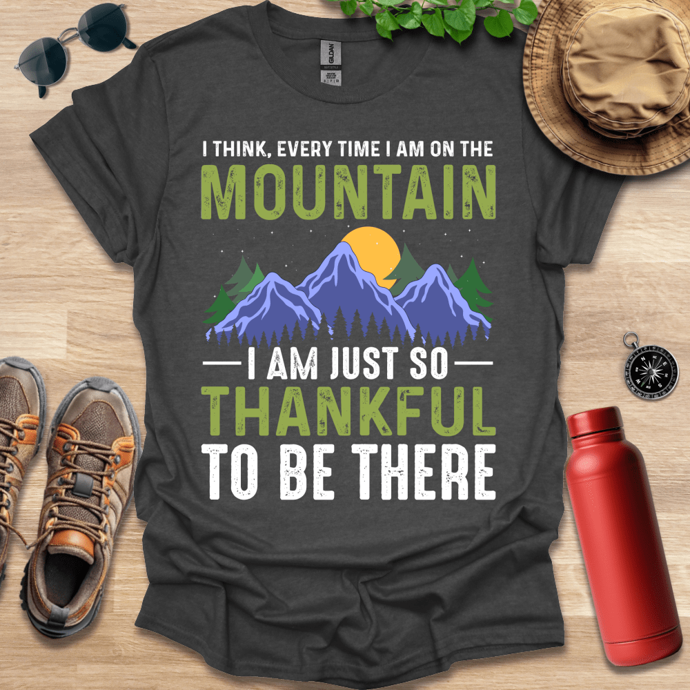 a t - shirt that says i think every time i am on the mountain i