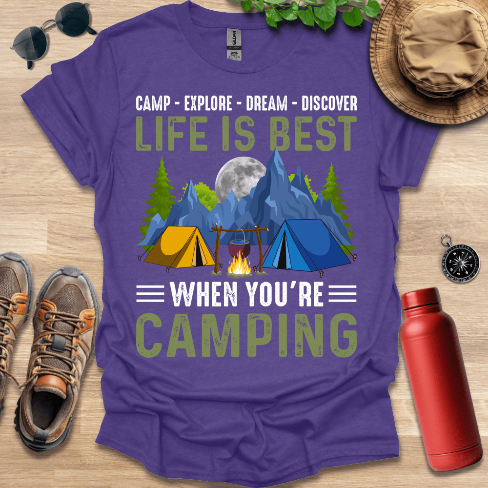 a purple shirt that says camp - explore - dream - discovery life is best when