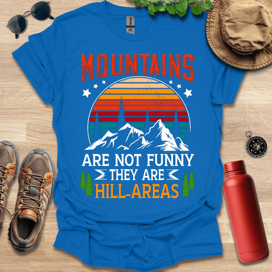 there is a blue shirt with mountains on it