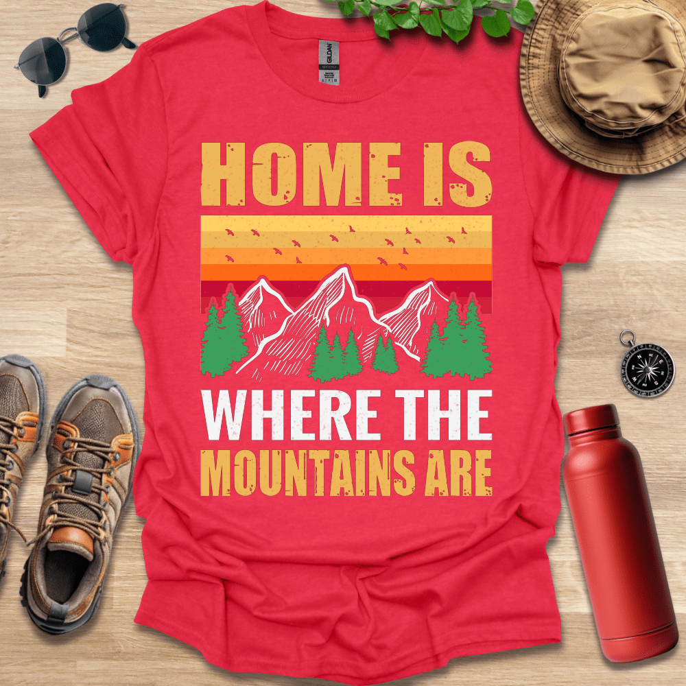 a red shirt that says home is where the mountains are