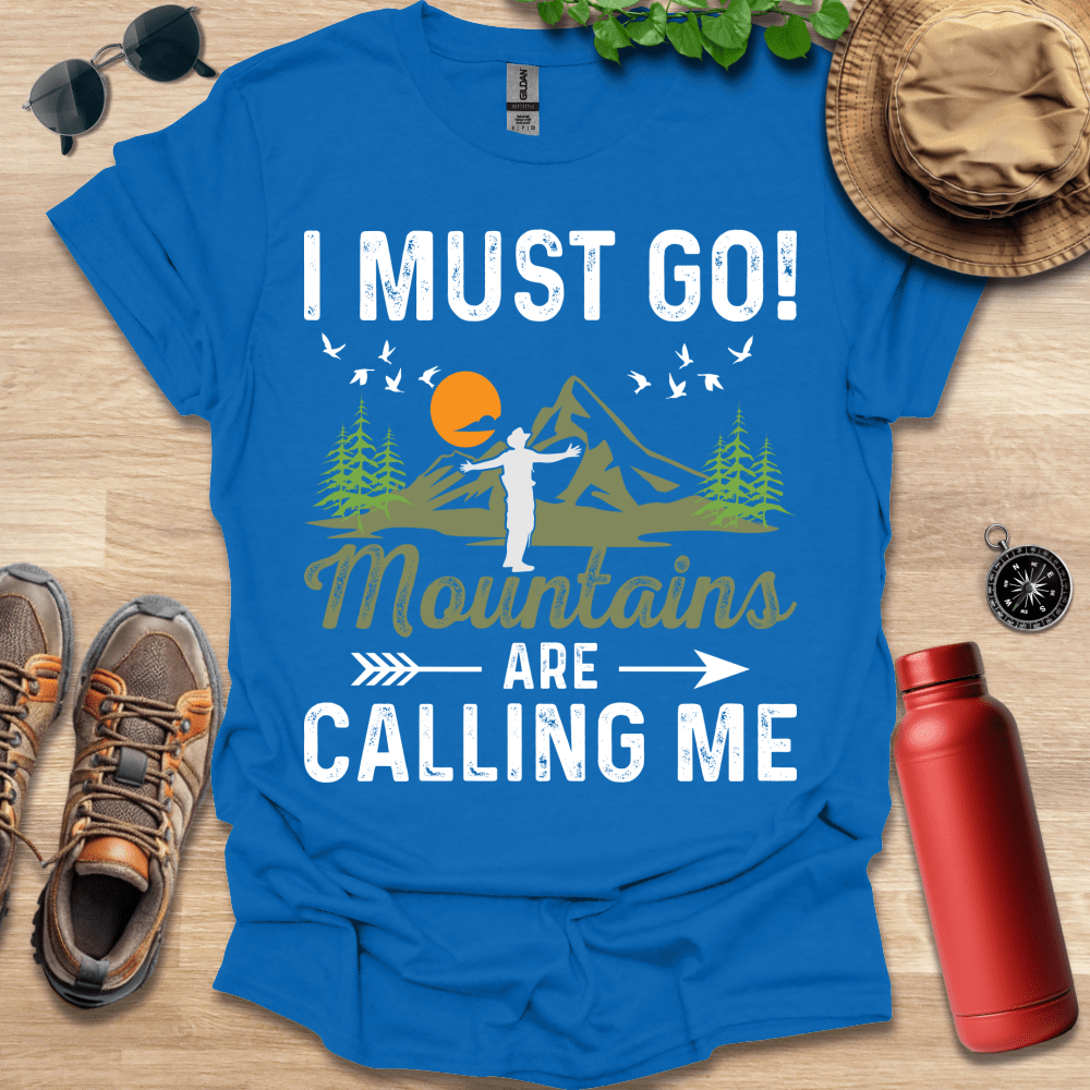 a blue shirt that says i must go mountains are calling me